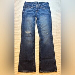 Women's American Eagle low rise slim boot blue jeans size 4 distressed knees